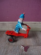 altes Blechspielzeug Clown auf