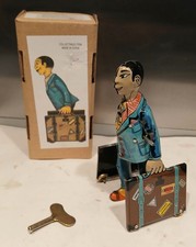 Blechspielzeug * Kofferträger